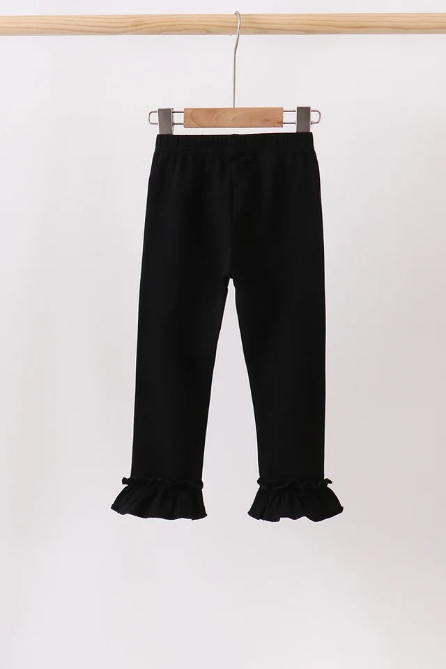 Black ruffle pants