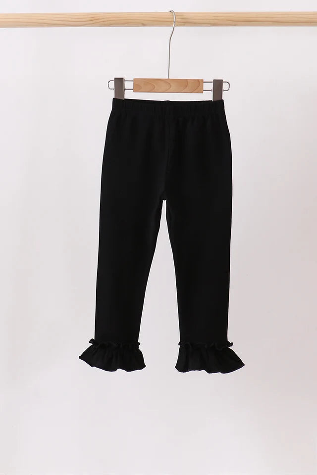 Black ruffle pants