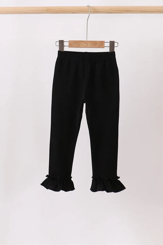 Black ruffle pants