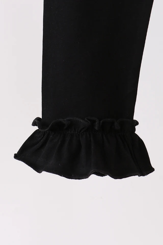 Black ruffle pants