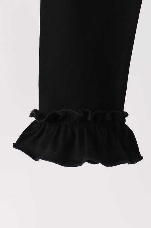 Black ruffle pants